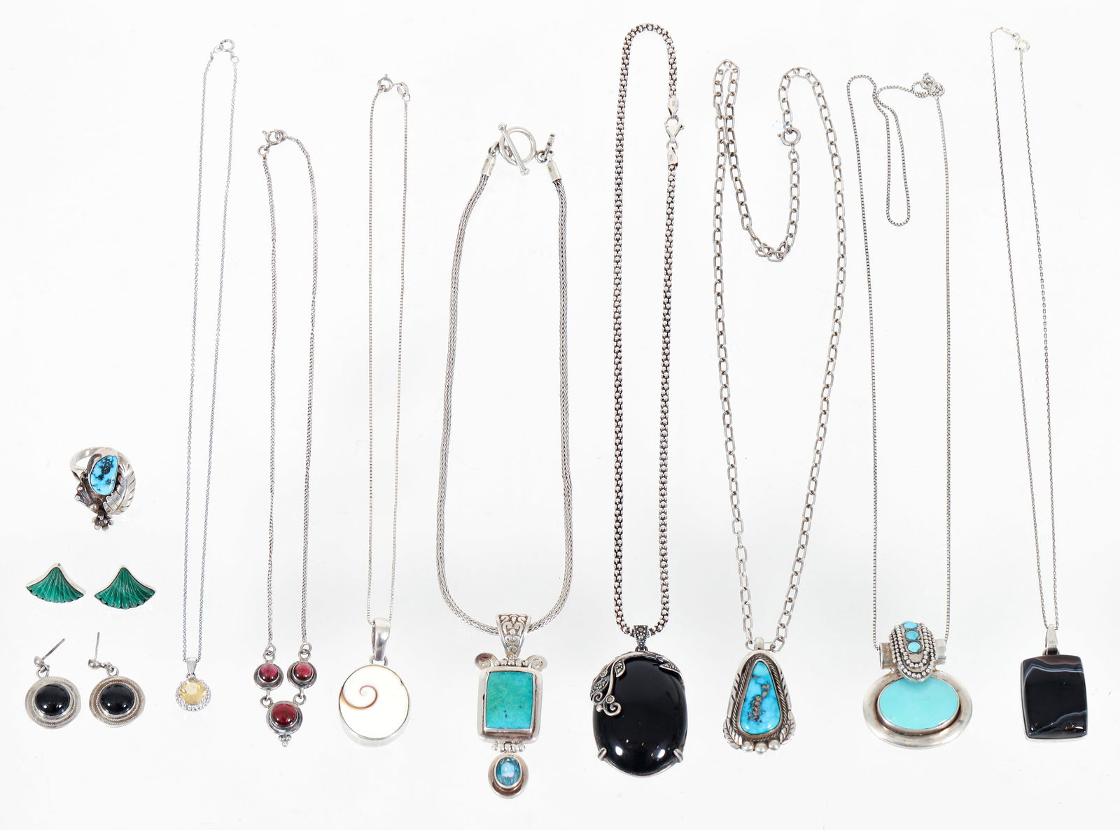 11 pieces of Sterling Silver Turquoise Necklaces and Ring: 11 pieces of assorted sterling silver jewerly. Includes: 4 Piece Sterling Silver and Turquoise Jewelry, includes 3 pendant necklaces and 1 ring: Square turquoise pendant with bezel set topaz stone dis