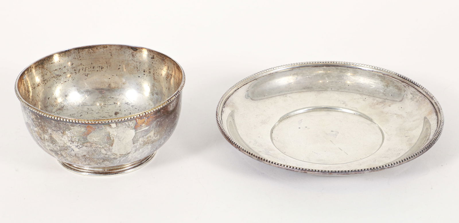 Tiffany Sterling Silver Bowl and Underplate: Tiffany and Co. / Tiffany Young and Ellis sterling silver bowl and underplate. Beaded rims. Bowl 2.75 x 5.5 inches, underplate 1 x 7.5 inches. Approximately 15.56 ozt combined. Provenance: The Estate