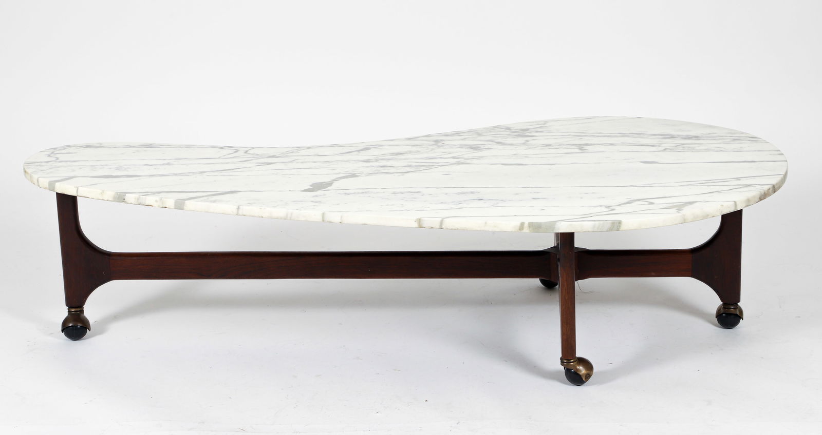 MCM Boomerang Marble Top Walnut Coffee Table: Mid Century Modern marble top boomerang/kidney-form coffee table. Carerra marble boomerang or kidney-form top surface resting on a cruciform walnut base with castors. Apparently unlabled and