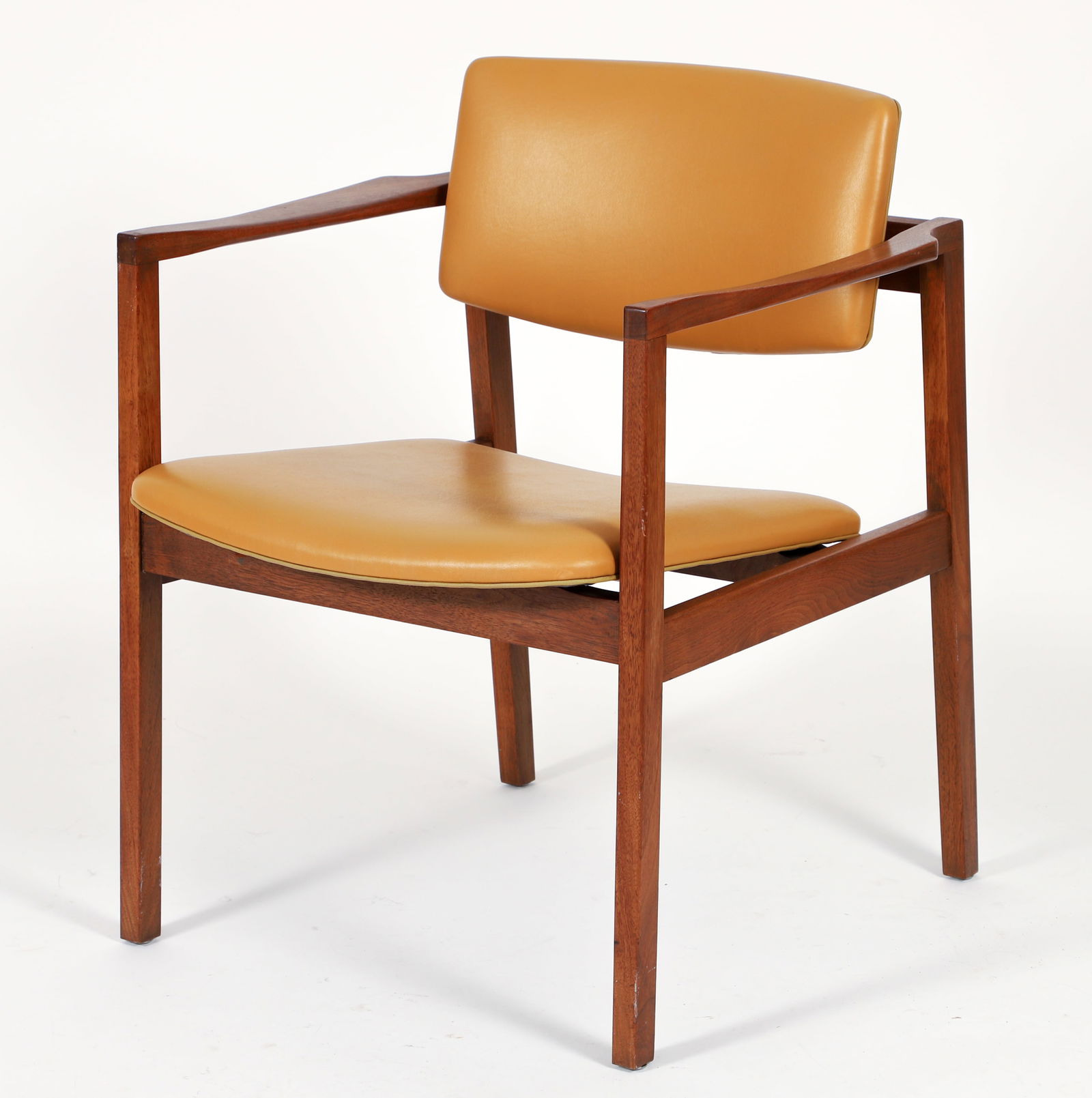 Giacomo Buzzitta for Stow and Davis Model 476 Arm Chair: Giacomo Buzzitta (American/Italian, 1910-1989) for Stow and Davis Model 476 Arm Chair, Grand Rapids, MI, 1960s. Walnut Wood Frame with Golden Yellow Vinyl Upholstery. 2 Stow & Davis Co. labels at unde