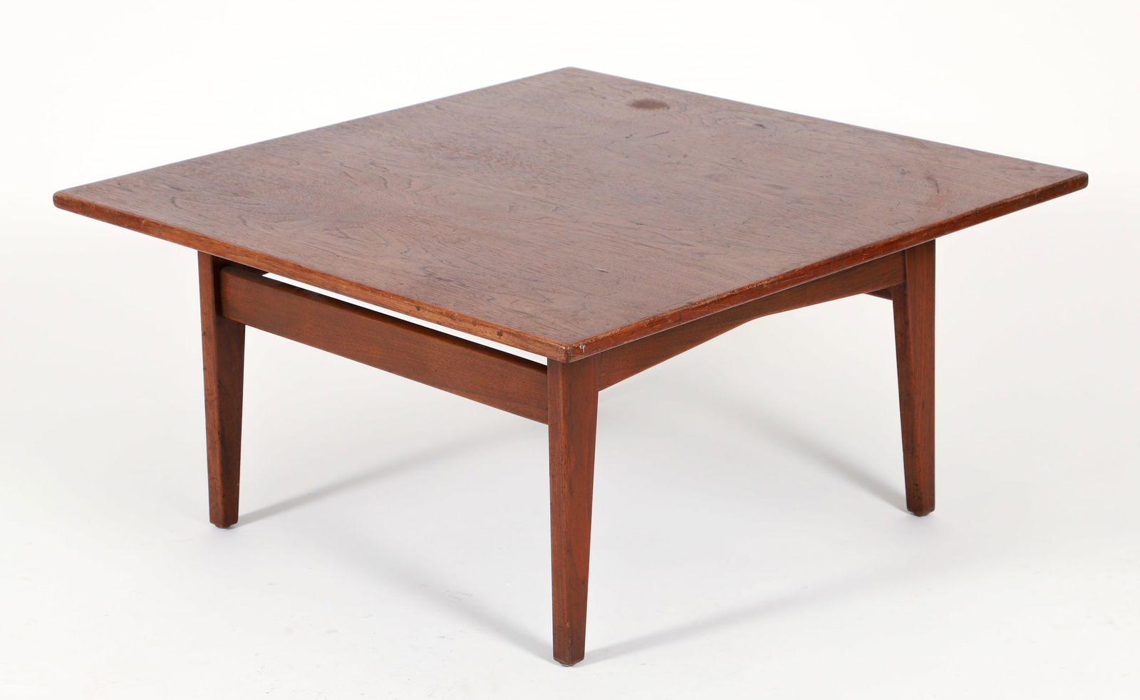 Jens Risom Design Mid Century Modern Walnut Cocktail Table: Jens Risom for Jens Risom Design walnut square cocktail table, American, mid century modern. Floating top surface above squared tapered legs. Jens Risom Design label at underside. 24 x 26 x 32 inches.