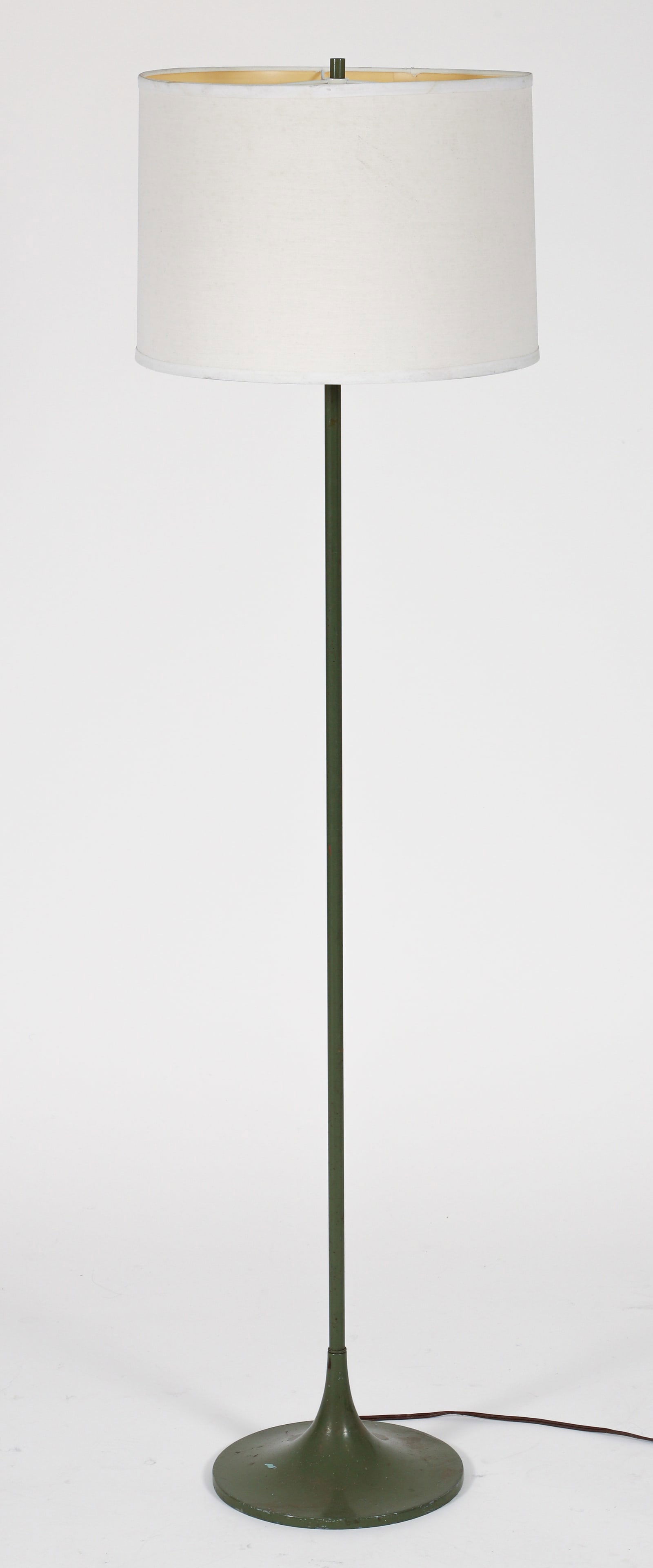 Laurel Floor Lamp in Olive Green: Laurel floor lamp in olive green, American, mid century modern. Metal fluted base. 55.5 inches height. The white drum shade is 15 inches diameter.
