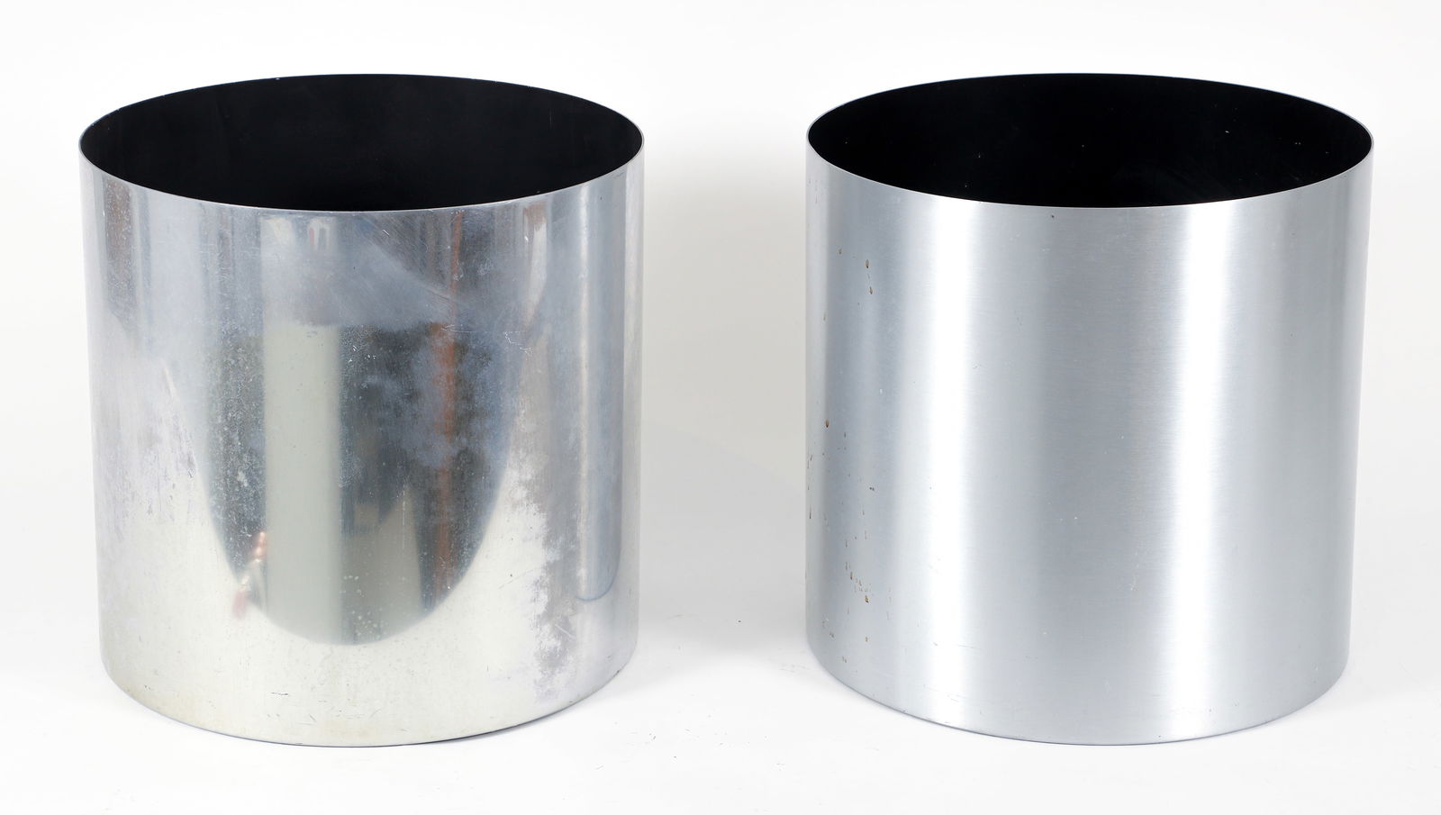 Pair of Paul Mayen for Habitat International Planters: Pair of Paul Mayen (Spanish, 1916-2000) for Habitat International Planters, New York, NY, 1960s/1970s. Spun aluminum and black enamel. 15.5 x 16 inches each. Mayen was born on May 31, 1916, in La L?ne