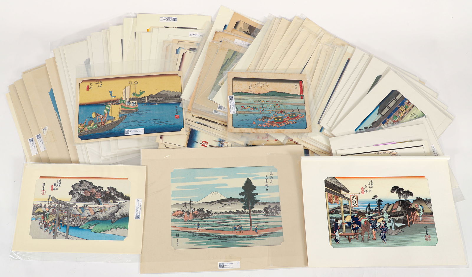 Very Large Group of Hiroshige and Hokusai Woodblock Prints: Group of over 50 Utagawa Hiroshige and Katsushika Hokusai Japanese Woodblock Prints, all modern reproductions, includes prints from series 36 Views of Mount Fuji, 53 Stations of the Tokaido, 69 Statio