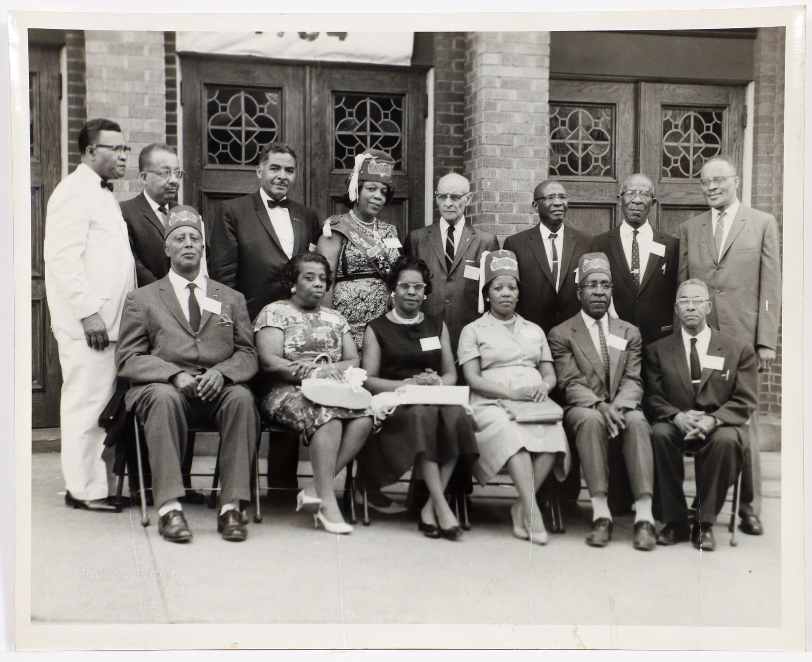 Charles Teenie Harris Photograph Shriner Group Portrait: Harris, Charles (Teenie) (American/Pittsburgh, 1908-1998), Group Portrait of Men and Women in Shriner Fezzes, c. late 1950s, gelatin silver print, image size 7.5 x 9.5 inches, sheet size 8 x 10 inches