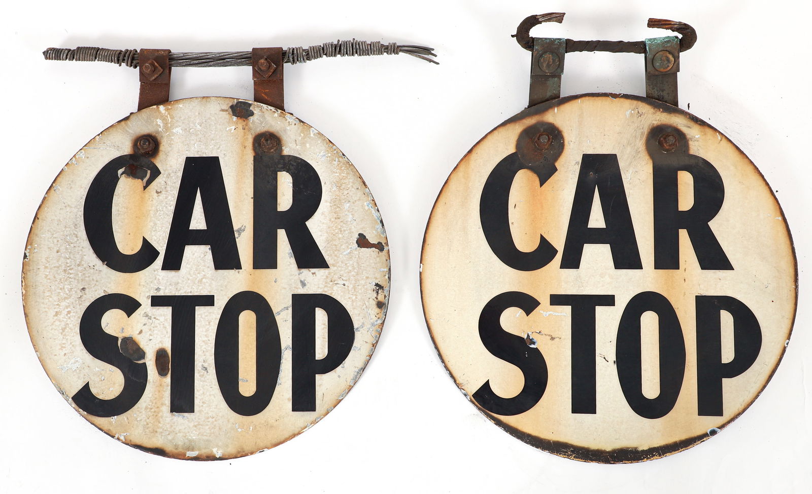 2 Early 20th Century Pittsburgh Streetcar Signs: 2 early 20th century Pittsburgh streetcar/trolley two-sided signs. Both circular metal "Car Stop" signs with black lettering on white porcelain enamel ground. Each with two cable attachment hinges at