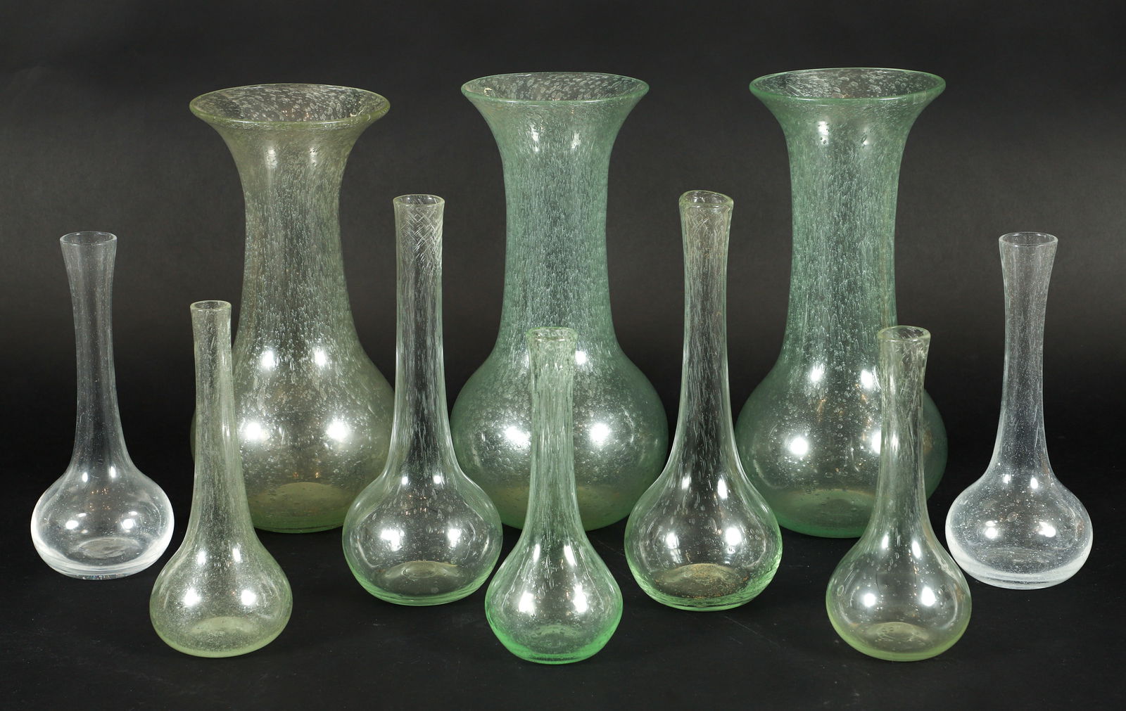 7 Verrerie de Biot Bud Vases and 3 Flower Vases: 7 Verrerie de Biot Bud Vases and 3 Flower Vases , tallest Bud Vase 11 inches, Flower Vases 13 inches tall, with acid etching Biot logo on undersides. Provenance: The Estate of Edith (Toto) Fisher,