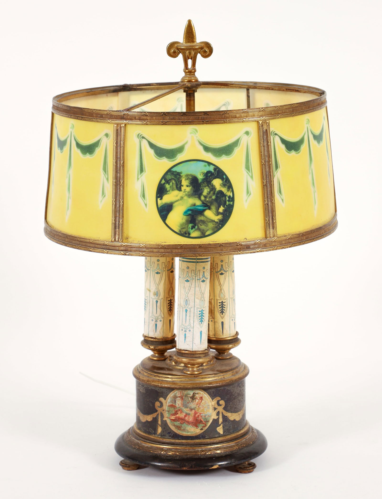 French Style Classical Motif Bouillotte Lamp: French style classical motif 3-light bouillotte table lamp. Polymer panel inserts printed with swags and cherubs, adjustable central stem, 3 candle-form lights resting on an enamed base featuring clas