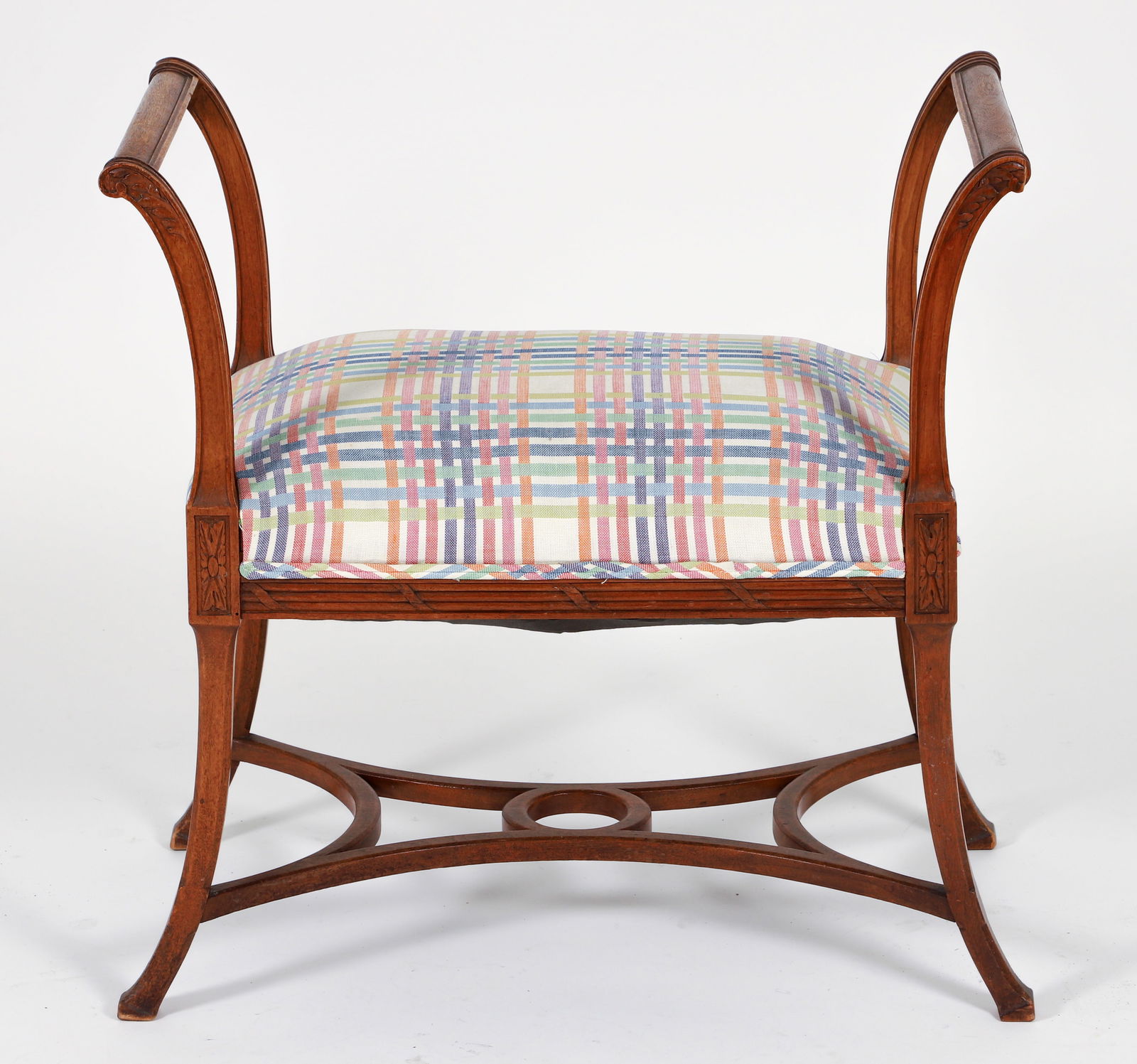 French fruitwood bench with carved corner decorations and modern upholstery: French fruitwood bench with carved corner decorations and modern upholstery, with scrolling arms and spade feet, measuring 28 x 27.5 x 16 inches. Provenance: The Estate of Edith (Toto) Fisher, Pittsbu