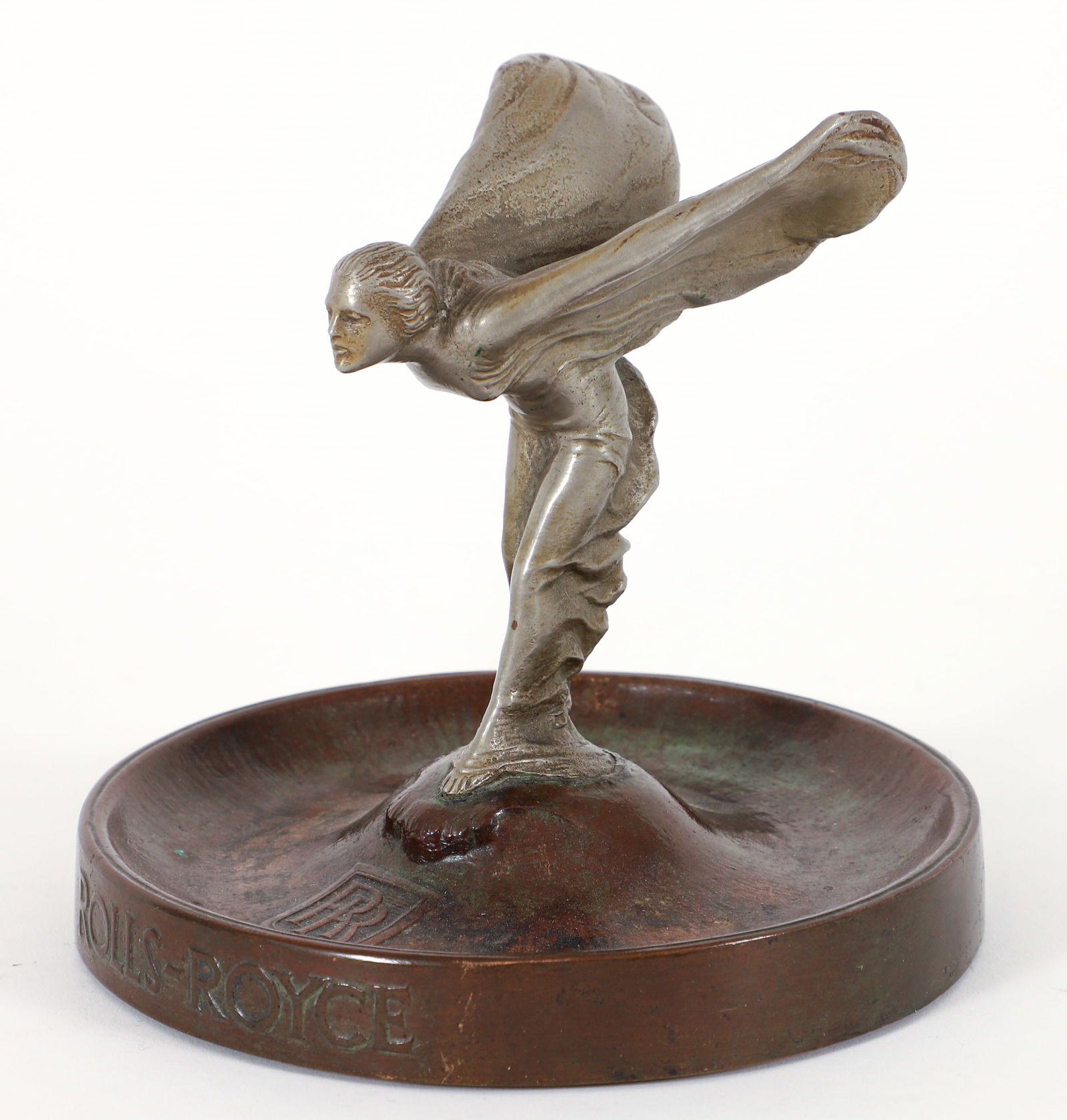 Rolls-Royce Spirit of Ecstasy Hood Ornament Ashtray: Rolls-Royce Spirit of Ecstasy flying lady hood ornament ashtray. Bronze base cast by Gorham foundry, Rolls-Royce RR logo stamp, metal flying lady figure above. Gorham Foundry stamp on base. 5.5 x 6.5