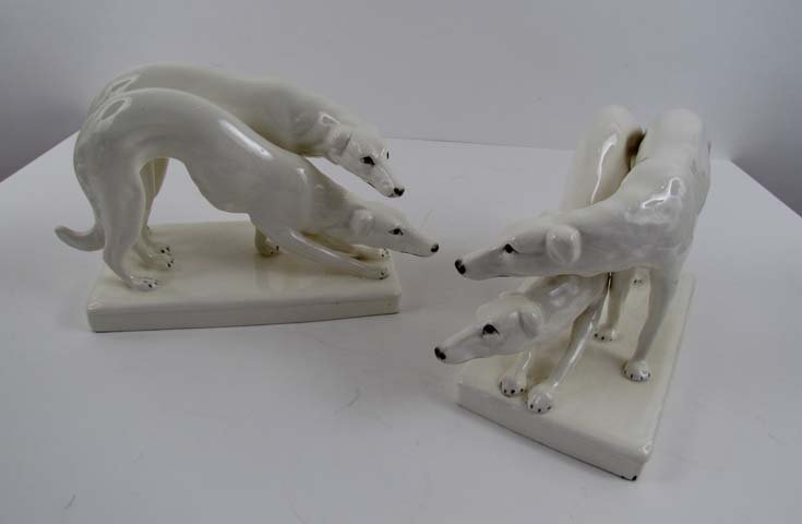 2 Royal Dux porcelain Russian Wolfhounds: Title: 2 Porcelain Russian Wolfhounds Royal Dux Made in Czechoslovakia Medium: glazed porcelain Dimensions: 8.5 x 13 x 5.5 inches Signature: marked 'Royal Dux Made in Czechoslovakia