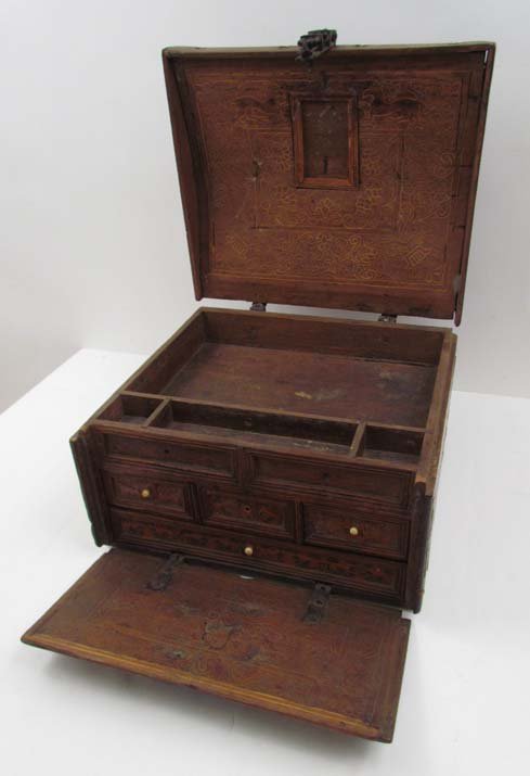16th to 18th Century Continental Writing Box: Artist: Continental possibly Spanish Craftsman Title: Writing Box with inlaid wood scrolling design with two lions surrounding the escutcheon Date: 16th to 18th Century Medium: inlaid wood with hammer