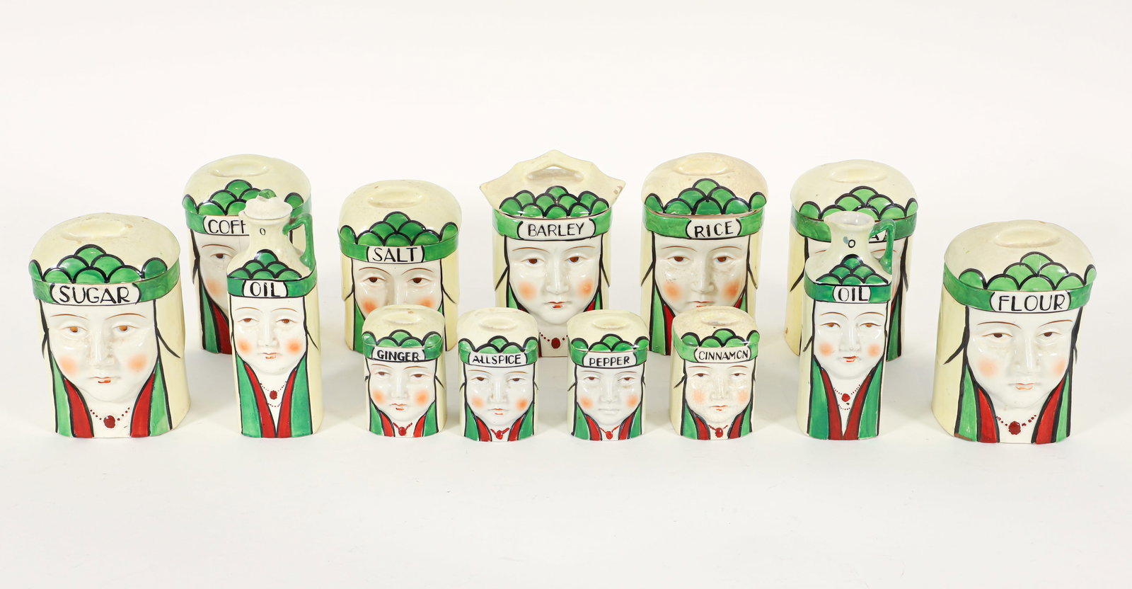 Set of Rare Art Deco Mepoco Japan Figural Cannisters: 13 piece set of rare Art Deco Mepoco Japan figural canisters, Japanese, 1924. Marked Mepoco Japan at undersides. Small canisters 4 x 2.75 x 2.75 inches, oil and vinegar 8 x 3 x 3 inches, large caniste