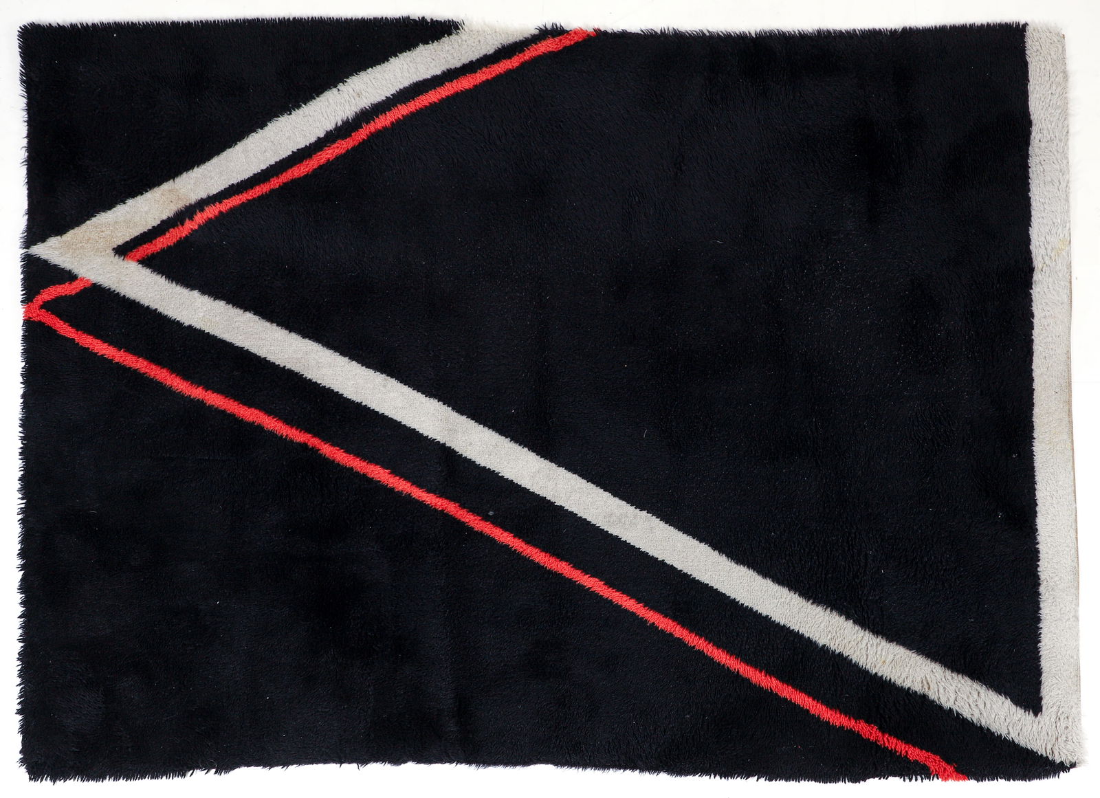 Perfections by EGE Modern Design Rya Shag Rug: Perfections by EGE modern design rya shag rug. White and red graphic designs on a black ground. Labels on the underside. 4 feet 7 inches x 6 feet 7 inches.