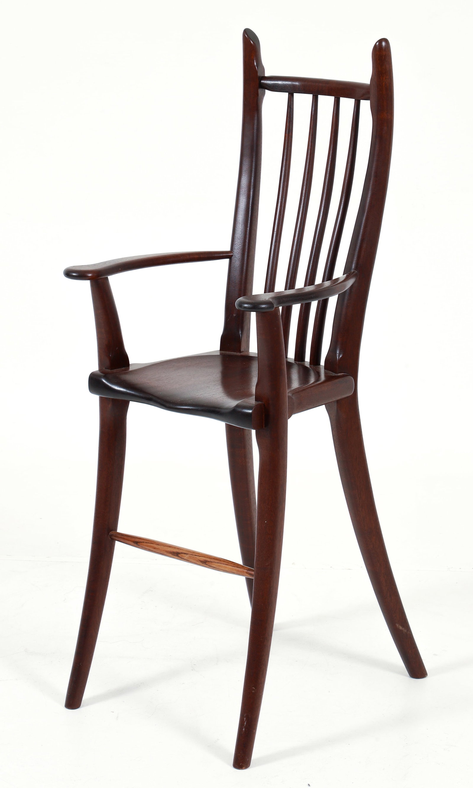 Stephen Swift Youth High Chair: Stephen Swift youth high chair, American, 2000s. Studio craft high chair with slight saber legs. Apparently unsigned. 40 x 16 x 19 inches. Seat height 20 inches.