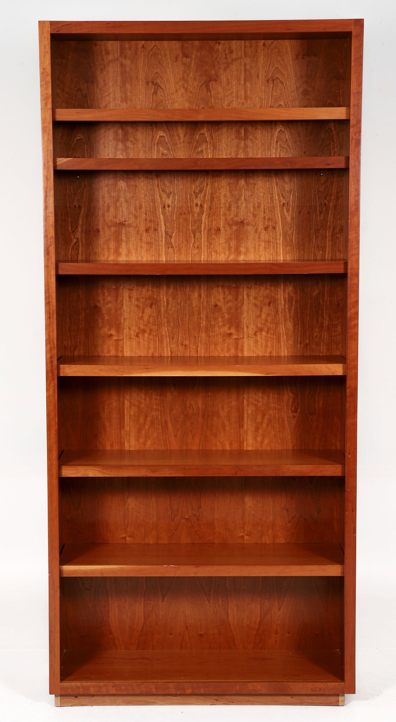 Joe Kelly Custom Cherry Tall Bookshelf: Joe Kelly (American/Pittsburgh, Contemporary) custom made cherry bookshelf. 6 shelves, resting on a base. 87 x 41 x 12 inches.
