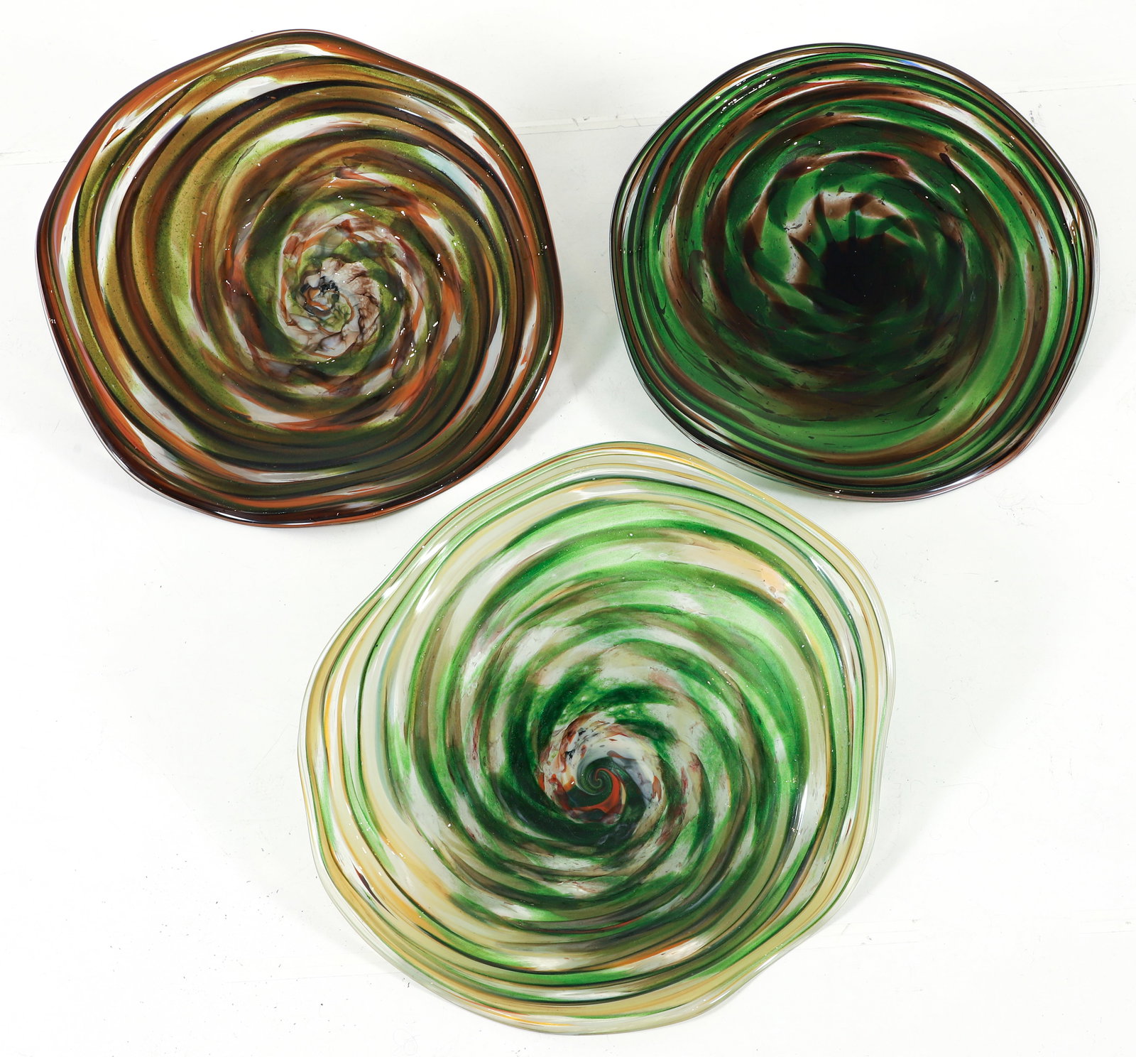 Kathleen Mulcahy Glass Wall Sculptures 3 Saucers: Mulcahy, Kathleen (American/Pittsburgh, b. 1950), 3 Saucers, 2000s, blown glass wall sculptures in green. Etched signature on one. Ranging in size from