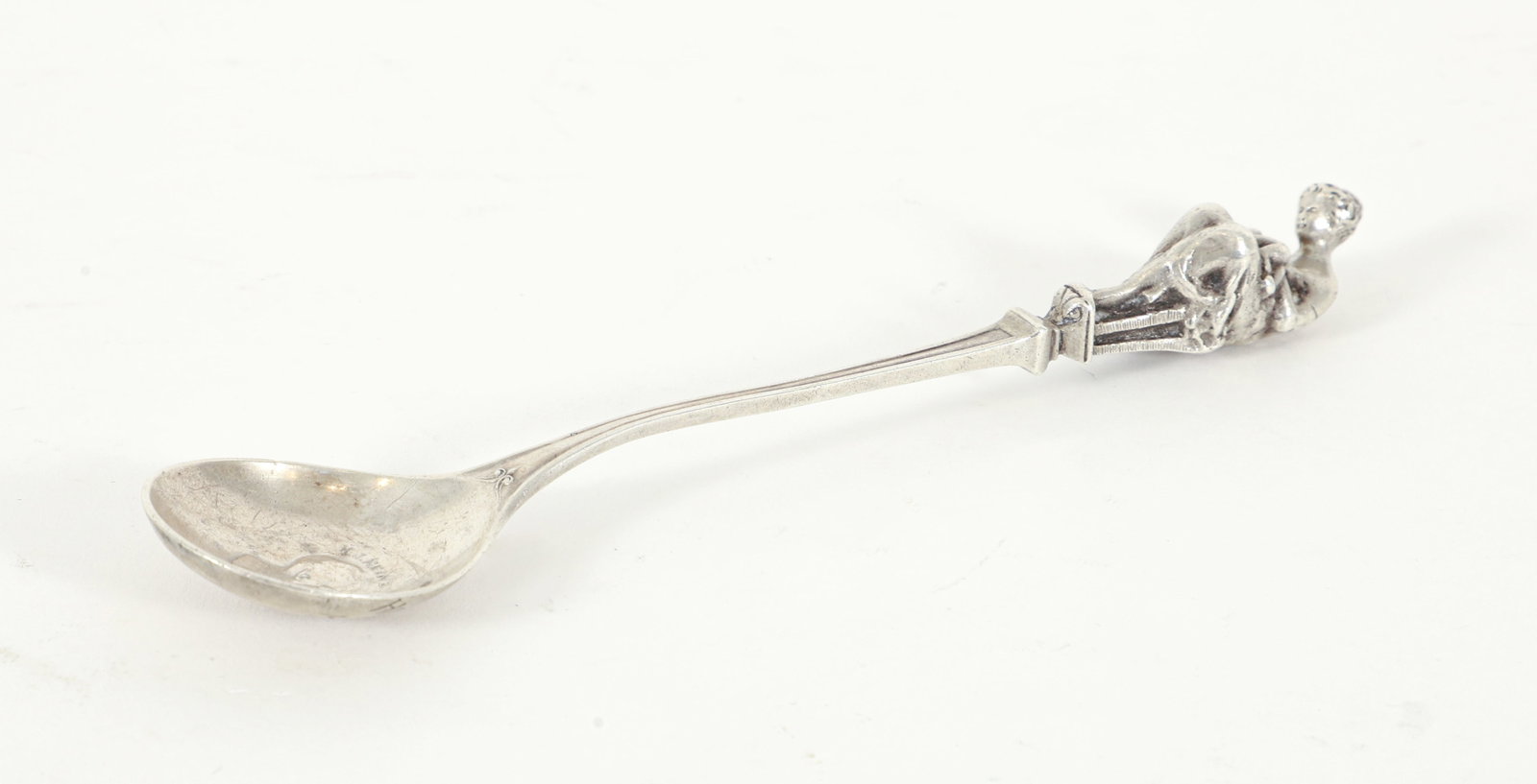Emile Fuchs for Cartier H.J. Heinz Sterling Silver Spoon: Emile Fuchs for Cartier, H.J. Heinz commemorative spoon, American, early 20th century 6.75 inches. Approximately 2.23 ozt. Figural top depicting a mother and child. Engraved on the back Hilda Lane Gor