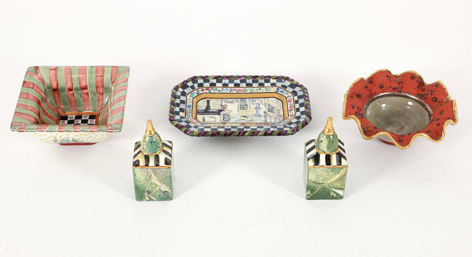 Group of 5 MacKenzie-Childs Ceramic Pieces: Group of 5 MacKenzie-Childs ceramic pieces, American, 1990s. Includes: faux hardstone salt and pepper shakers, 2 redware bowls with floral motif, vide poche. All appropriately marked at undersides.