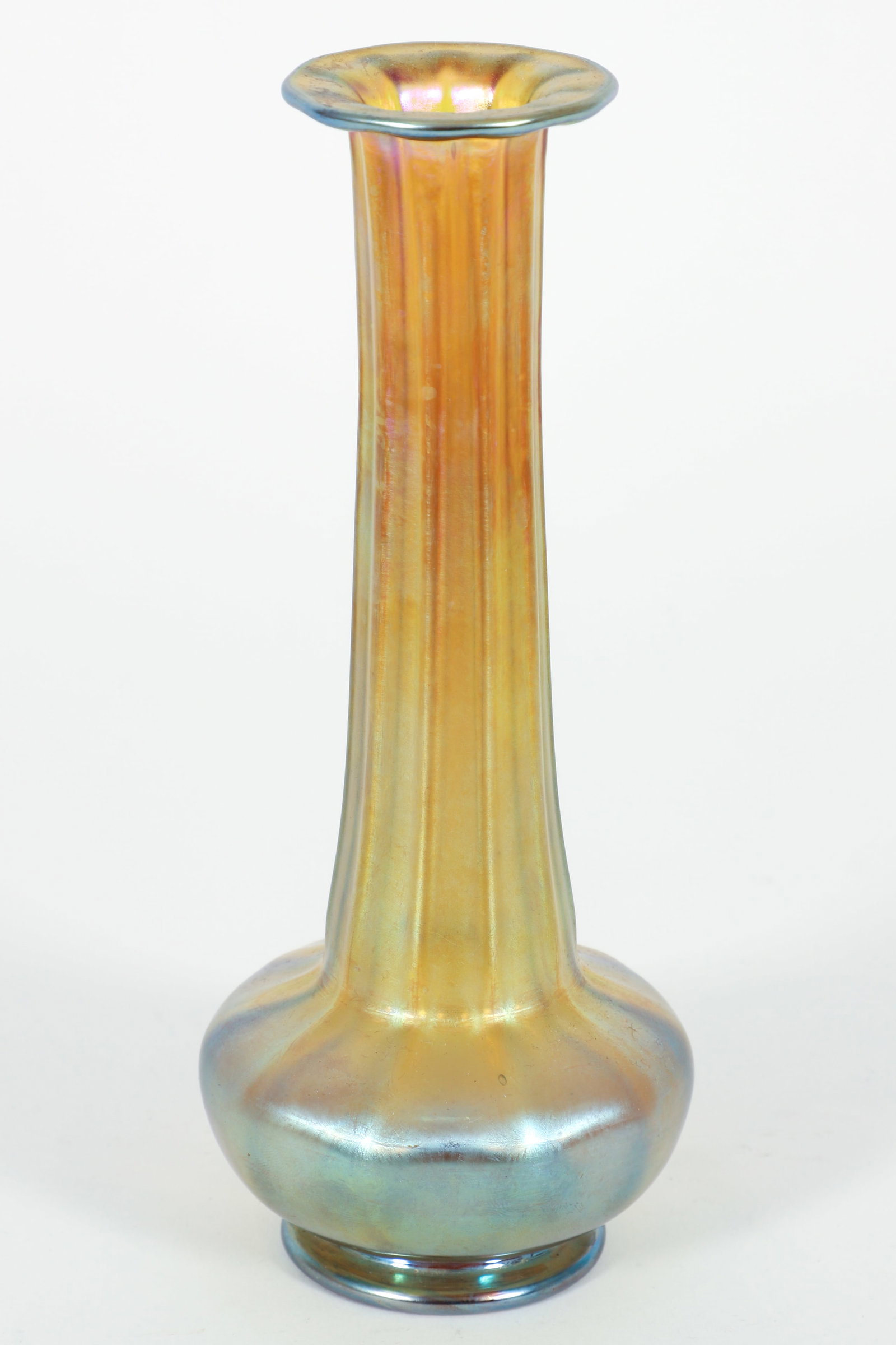 Louis Comfort Tiffany Gold Favrile Ribbed Vase Marked 1834: Louis Comfort Tiffany gold favrile ribbed vase. Marked at underside. Polished pontil. 8.25 x 3.25 inches.