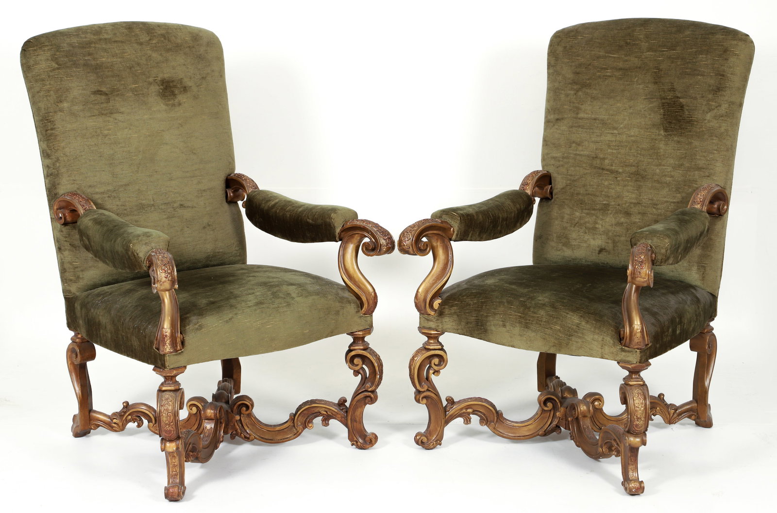 Pair of Early 20th century Louis XIV Style Fauteuil Armchairs: Pair of Louis XIV style Fauteuil armchairs, early 20th century. High rectangular backs, curved arms supported by carved scrolling supports, resting on legs with x-form stretchers and center ornaments.