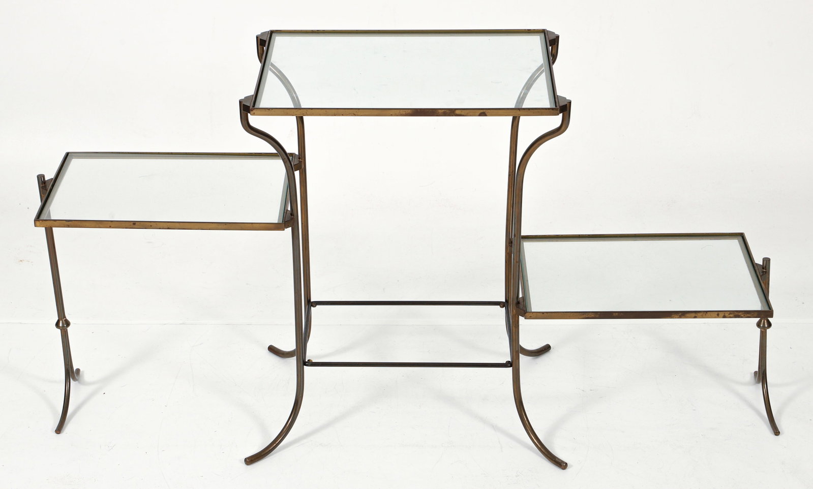 Italian Brass and Glass 3 Tier Stand: Italian brass and glass 3 tier stand. Rounded brass elegantly formed frame with glass inserts. Apparently unmarked. 24 x 47 x 17.5 inches.