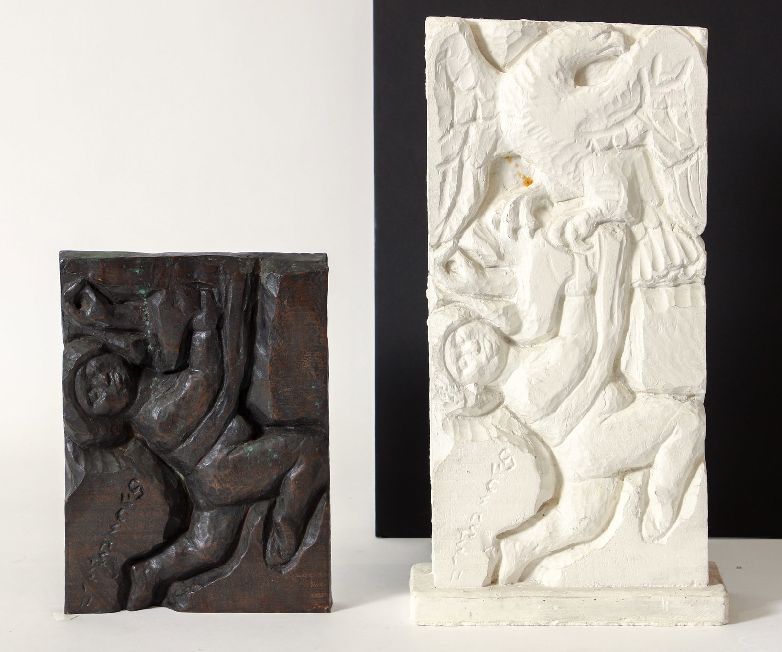 Pair of Enrico Glicenstein Ganymede Sculptures: Glicenstein, Enrico (Henryk) (Polish/Jewish/American, 1870-1942), pair of sculptures: Ganymede and the Eagle, with Child and Deer at verso, undated, plaster sculpture, posthumous cast, measures 18 x 9