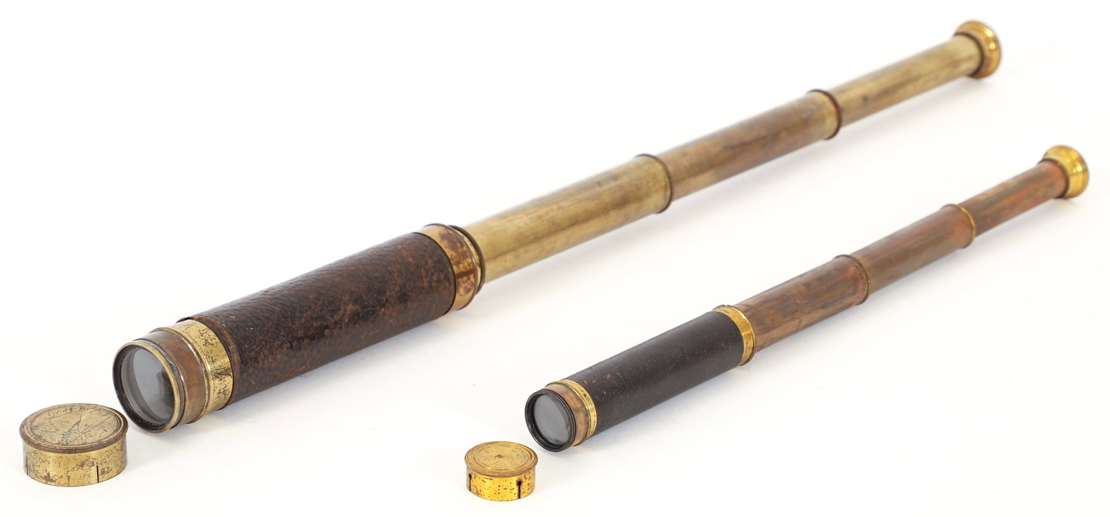 2 French brass and leather 3 draw telescopes: 2 Brass and leather wrapped telescopes with 3 draw telescoping, larger piece 24 inches in length fully extended, made in France inscribed on lens cap, smaller telescope is pocket telescope