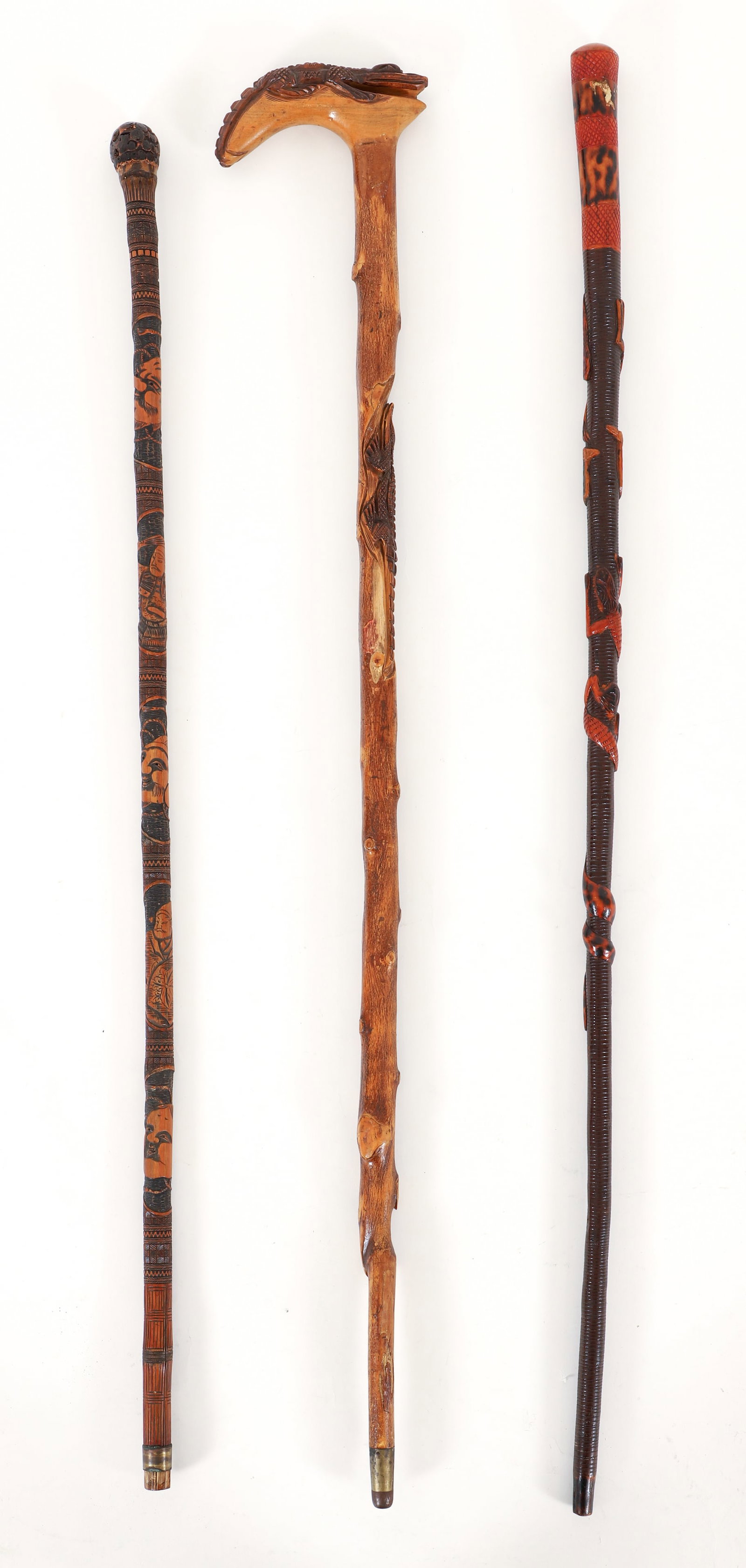 3 carved wood canes, including Alligator Head, 3 Masks, American Eagle (1 of 4)