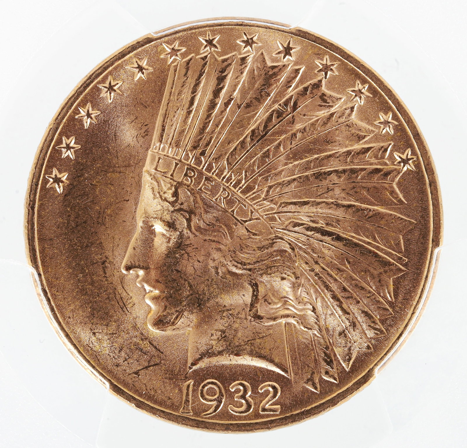 Graded 1932 Indian Head and Eagle Gold Ten Dollar Coin MS64: 1932 Indian Head and Eagle Gold $10 Coin, PCGS graded MS64, in case and protective box. Provenance: purchased in 2020 from Rare Collectibles TV. Please Note: Payment for this lot (and all other coin, 