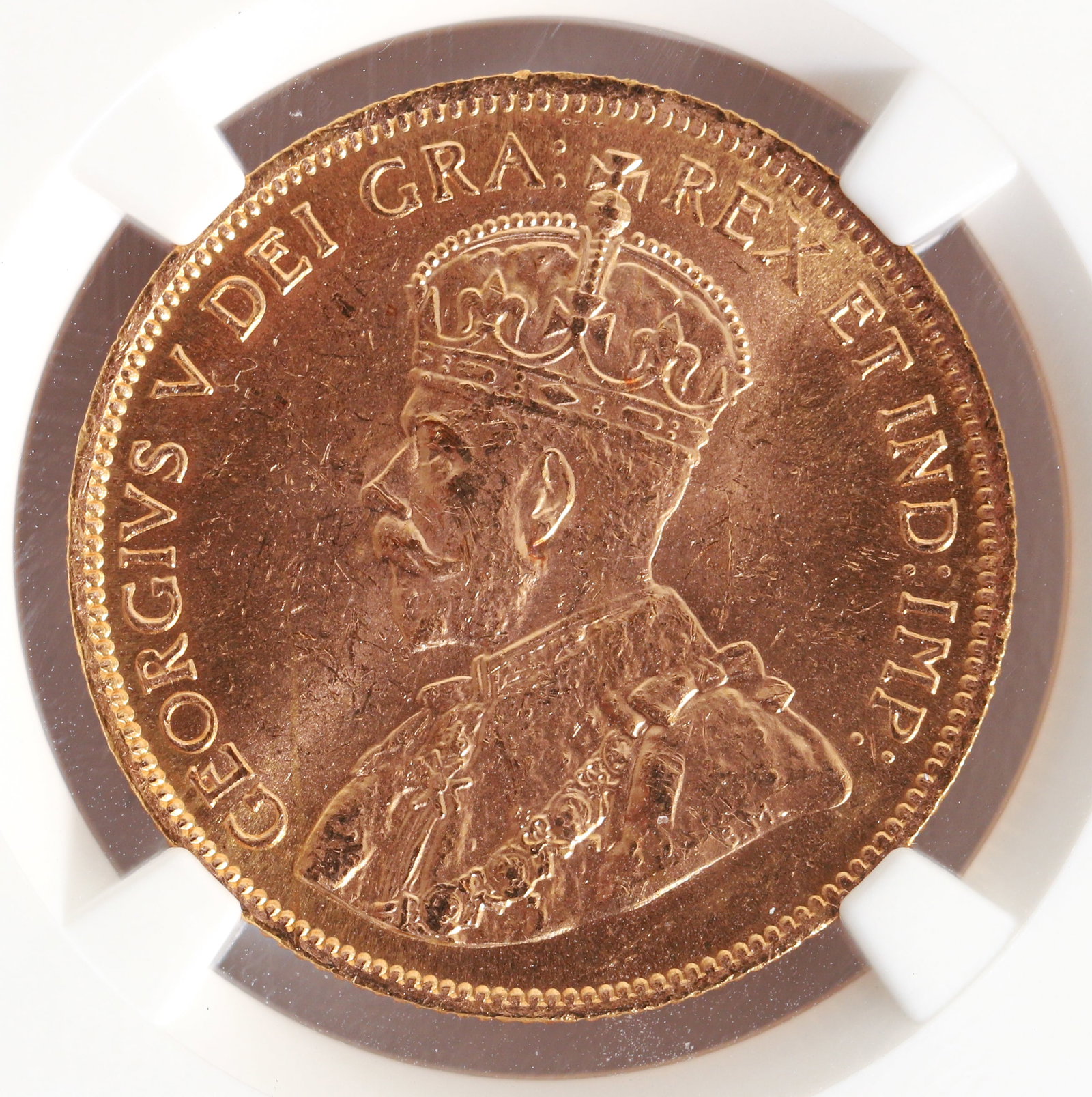 Graded 1914 Canada Ten Dollar Gold Coin MS63: 1914 Bank of Canada Hoard $10 Gold Coin, NGC graded MS63, in case and protective box. Provenance: Rare Collectibles TV. Please Note: Payment for this lot (and all other coin, gold and silver lots) can