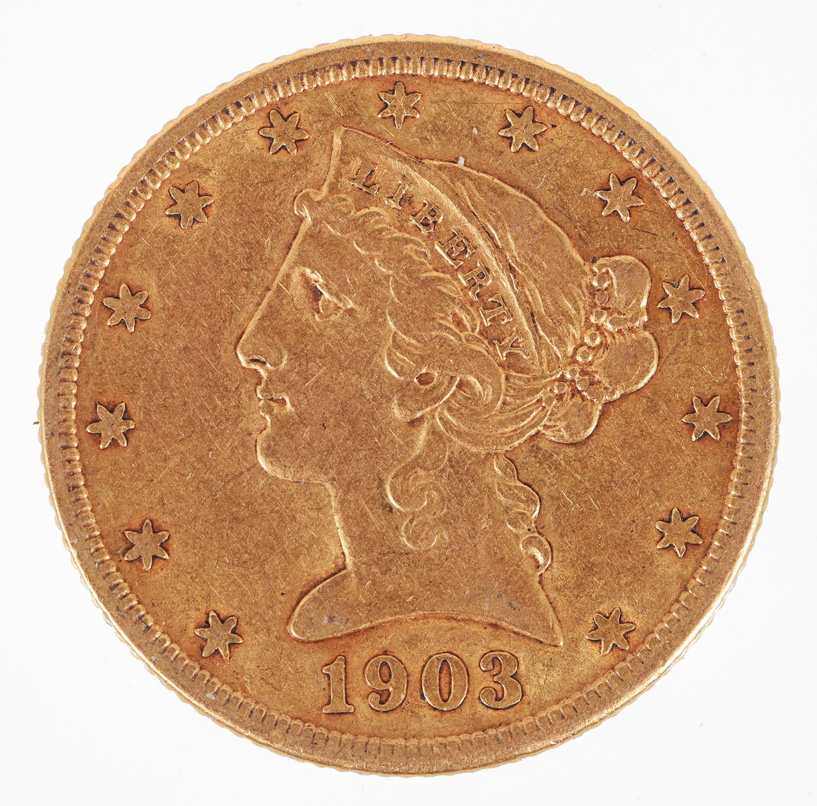 1903 $5 Gold Liberty Head Coin by Gobrecht: 1903 $5 Gold Liberty Head Coin. Features an exquisite design by Christian Gobrecht and is composed of 90% gold and 10% copper. Circulated but maintains a respectable level of detail. With a diameter o