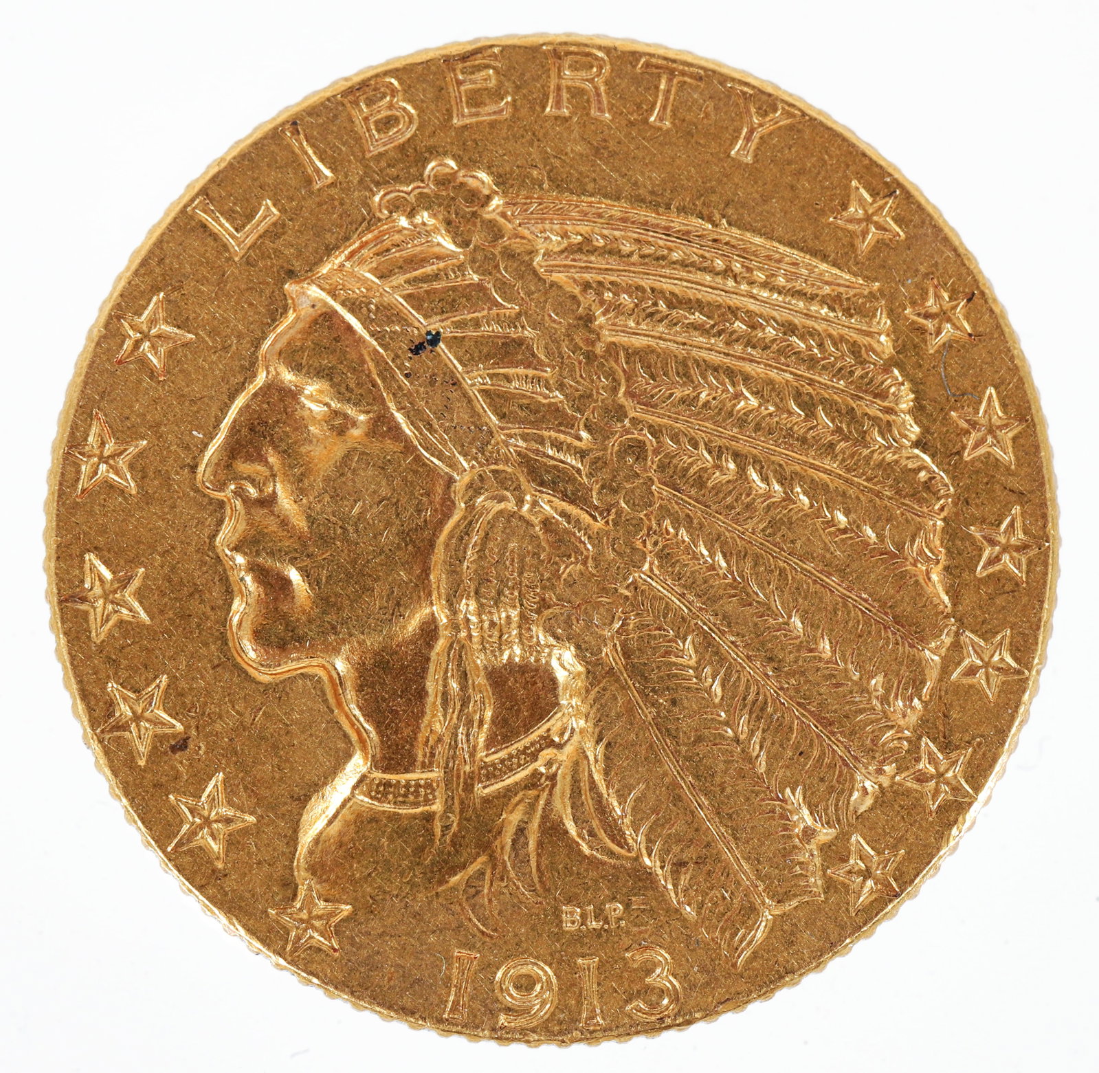 1913 Indian Head Five Dollar Gold Coin: United States five dollar Indian head 1913 Philadelphia mint gold coin. The obverse features a Native American chief, reverse depicts the perched American eagle. Weight: 8.359 grams (approximate). BLP
