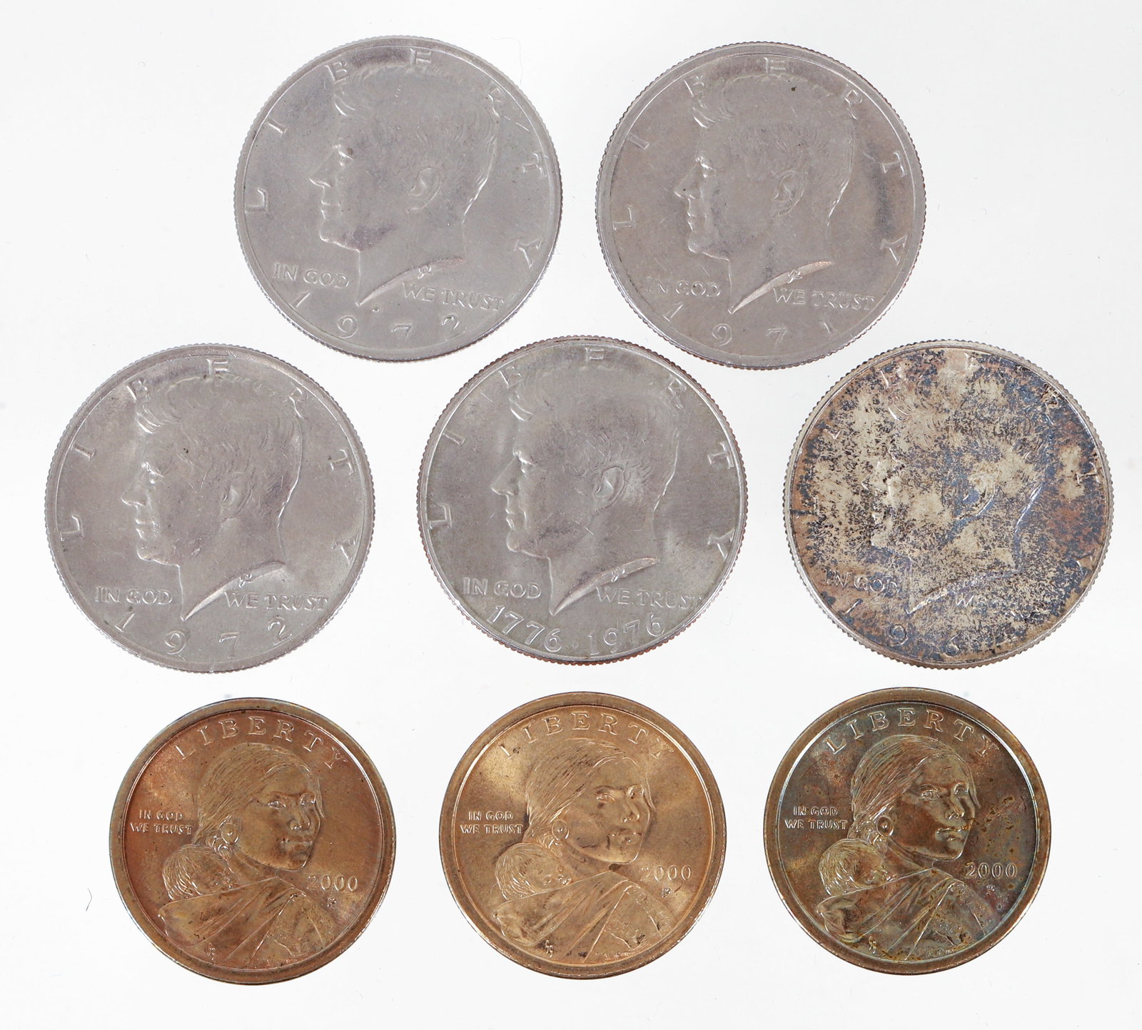 3 Sacagawea One Dollar Coins with 5 Kennedy Half Dollars: 8 American coins: 3 Sacagawea One Dollar Coins with 5 Kennedy Half Dollars. Please Note: Payment for this lot (and all other coin, gold and silver lots) can only be made by Wire/ACH Transfer,