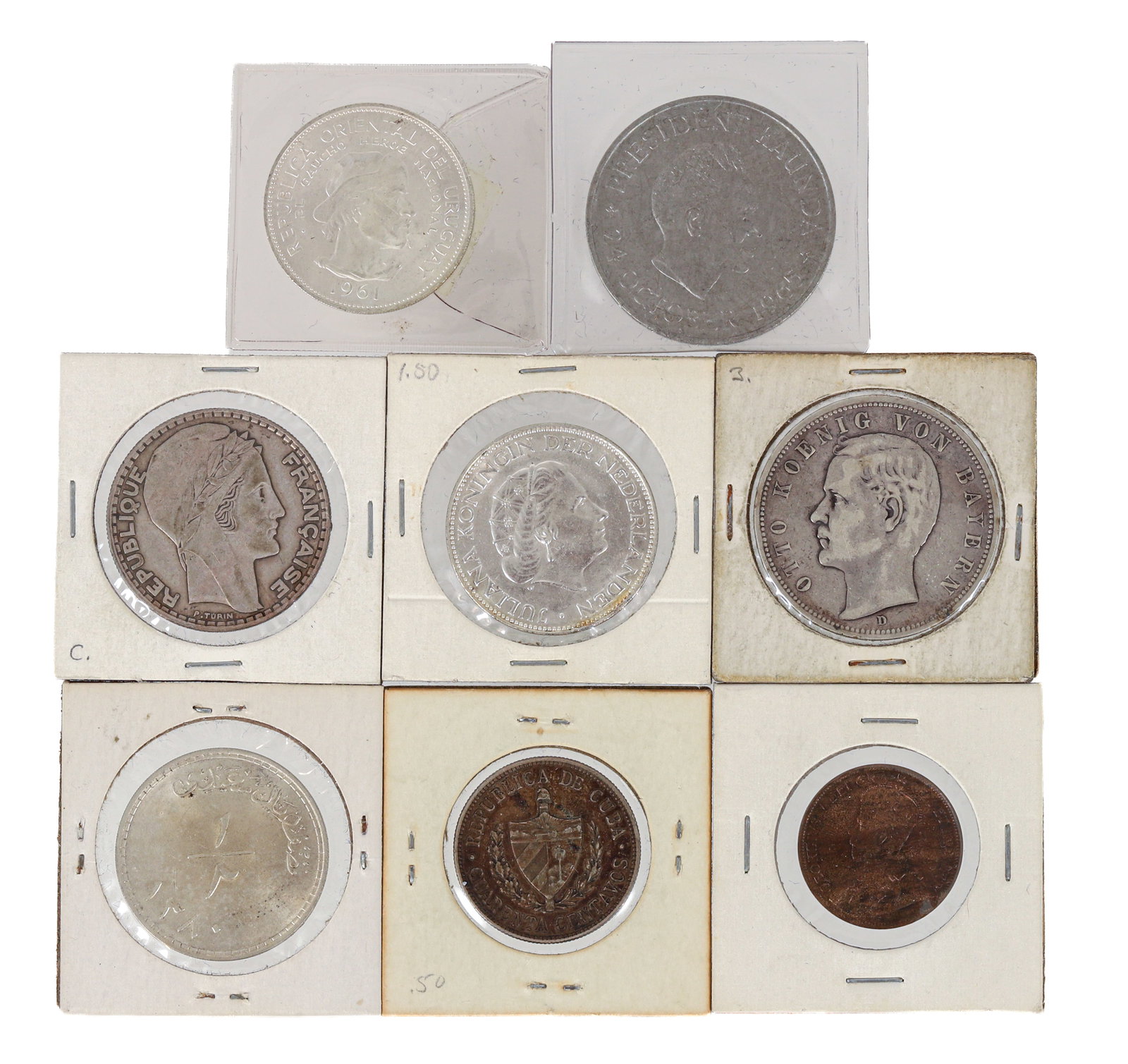 6 silver coins from around the world plus 2 others: 6 Silver Germany Funf Marks 1895, Netherlands 2 1/5 gilder, 20 Francs France 1933, Oman 2 1/2 rials, 10 Pesos Uruguay, President Kaunda Kenya, 2 with other metals with a Cuban 1915 Cuarenta Centavos, 
