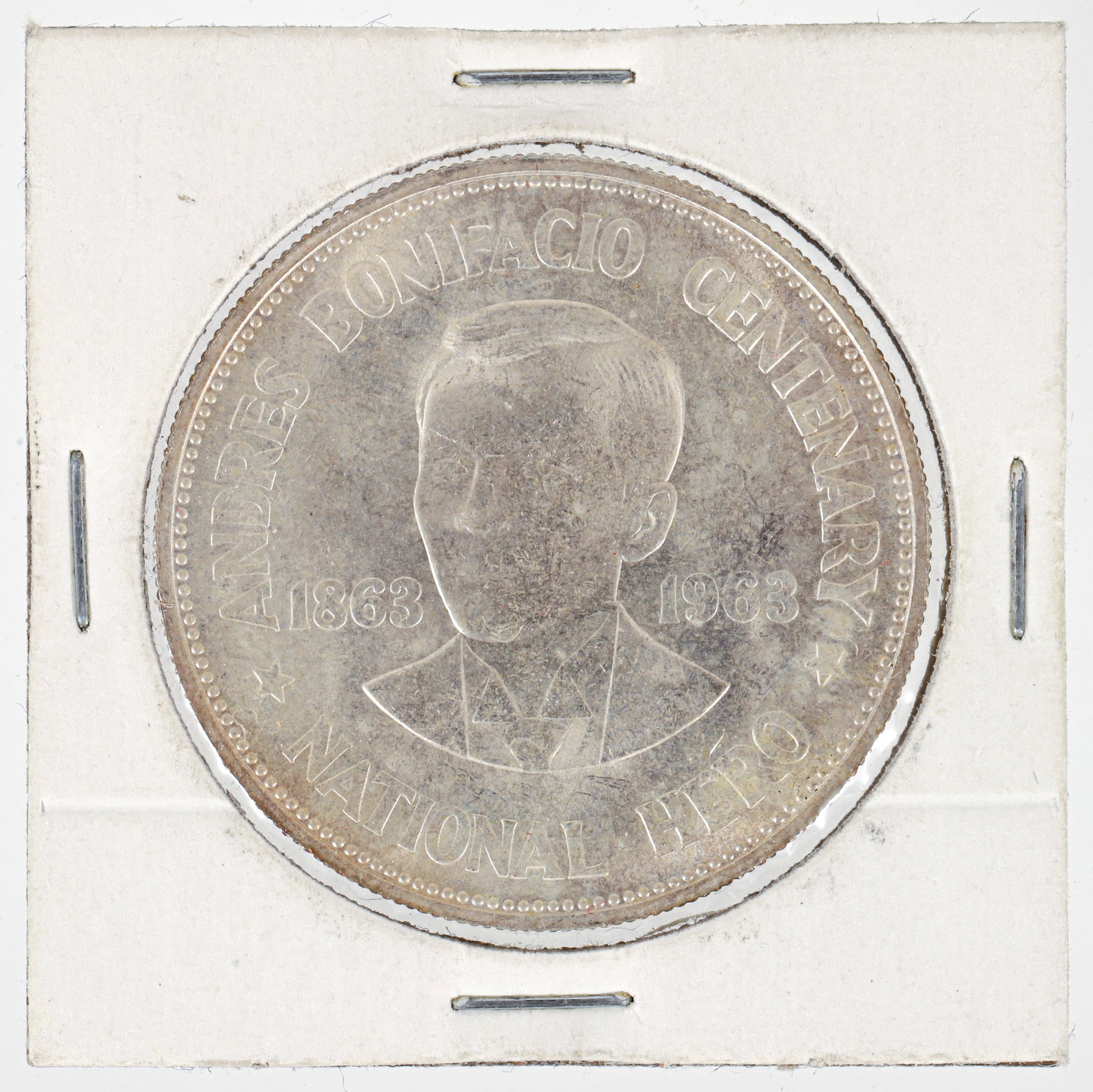 1963 One Peso Philippines Silver Coin: Silver Coin with Andres Bonifacio National Hero, silver. Please Note: Payment for this lot (and all other coin, gold and silver lots) can only be made by Wire/ACH Transfer, cashier's check or cash.