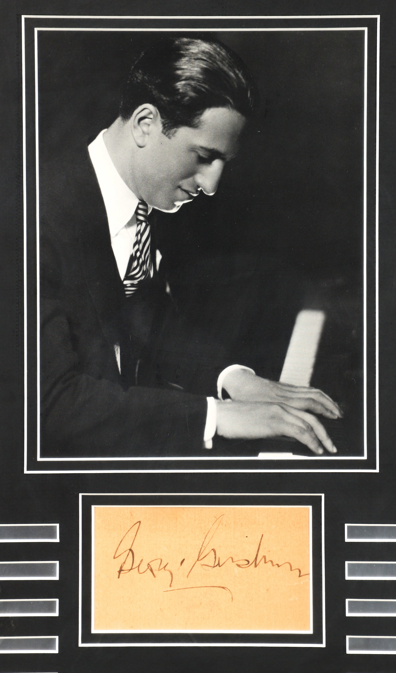 George Gershwin Autograph Card with Photo: George Gershwin Autograph Card, signed in ink, framed together with a photo, frame size 20 x 14 inches.