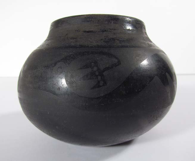 MARIA MARTINEZ Early BLACKWARE POT signed "Marie & Juli: Artist: Marie & Julian Martinez Title: small black ware pot with traditional Avanyu figure. Medium: black ware pottery Dimensions: 3.25 x 4.5 x 4.5 inches Signature: signed "Marie & Julian" on und