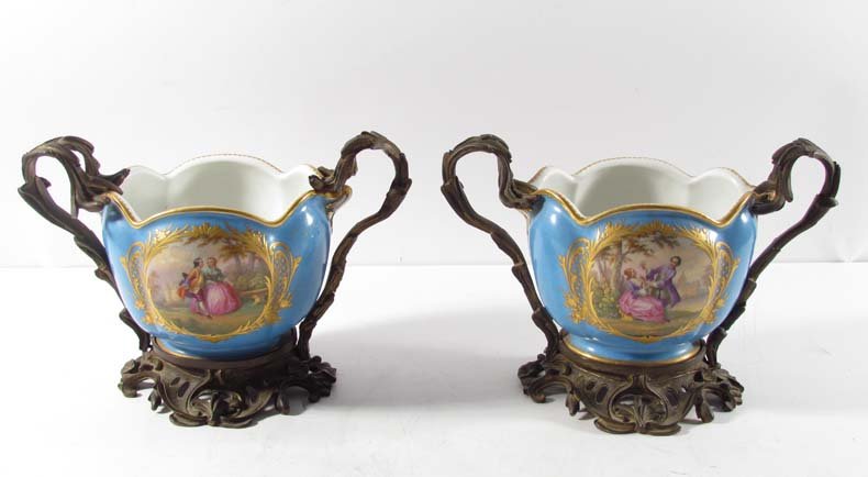 Pair of Sevres porcelain and ormolu cache pots: Title: Pair of Sevres porcelain and ormolu cache pots Date: 19th century Medium: porcelain and ormolu Dimensions: 7.5 x 10.5 inches Signature: signed with double "LL"'s and date letter "V"