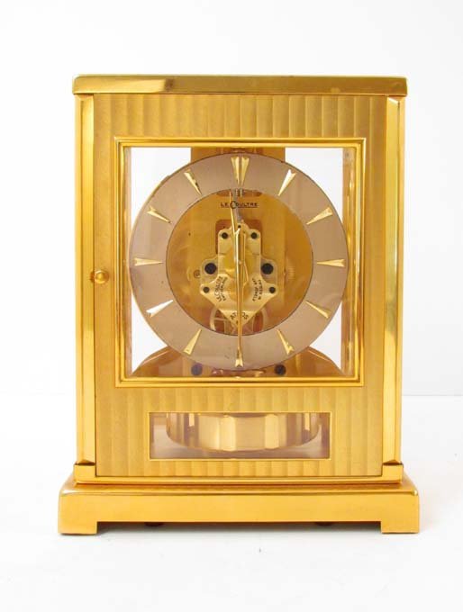 LeCoultre brass and glass Atmos mantle clock: Artist: Atmos/LeCoultre Title: LeCoultre brass and glass mantle clock Medium: brass, glass Dimensions: 9 x 7 x 5 inches Signature: printed Switzerland 15 jewels ATMOS on movement Provenance: