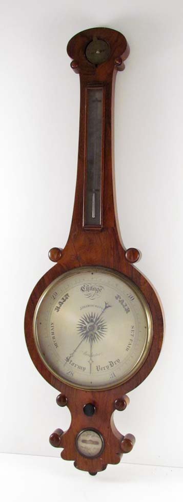 J.B.& J. Ronchetti Barometer: Title: J.B.& J. Ronchetti Barometer Medium: wood, glass, brass Dimensions: 40.5 x 13 x 1.75 inches Description: banjo style wall barometer