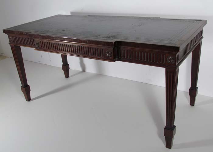 Leather topped mahogany coffee table: Title: Leather topped mahogany coffee table Medium: mahogany and leather Dimensions: 19 x 40.25 x 20 inches