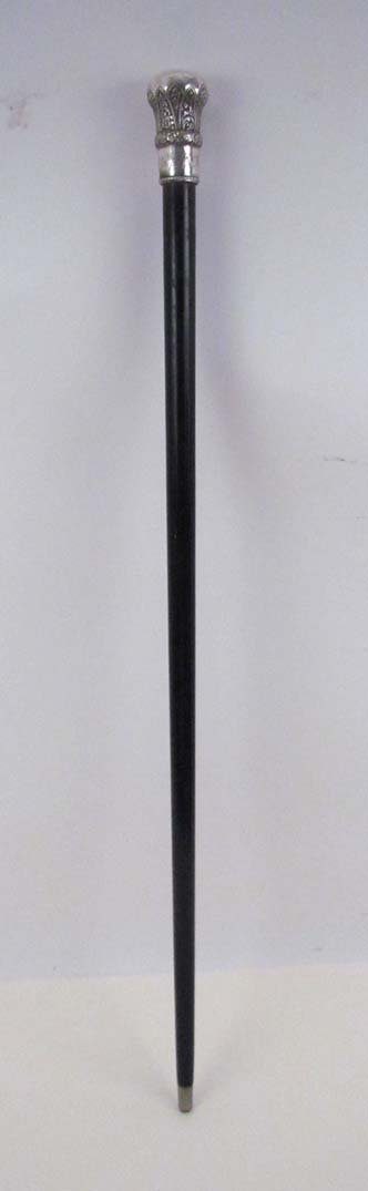 Large Victorian silver embossed presentation gentleman': Title: Large Victorian silver embossed presentation gentleman's walking stick Date: 1880 Medium: silver and ebony Dimensions: length: 34.75 inches Description: to Mr. R. S. Williams