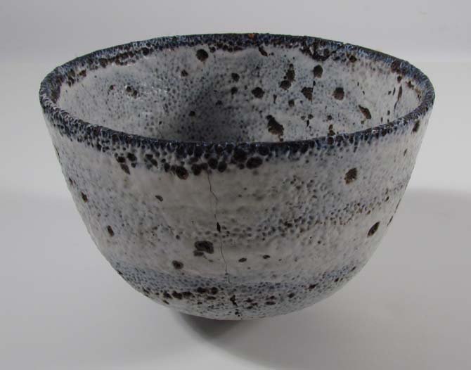 Natzler Small Bowl with white and blue orange peel: Artist: Natzler, Otto Title: Small Bowl Medium: highly textured glazed stoneware bowl Dimensions: 4 x 6 x 6 inches Signature: signed Natzler on underside Provenance: he Estate of Phylis and E
