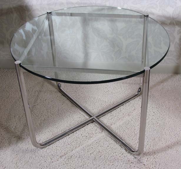 Mies Van der Rohe Colorless Glass-top Chromed Tubular: Artist: Rohe, Mies Van der Rohe Title: MR occasional table Date: Designed Germany, 1927/c. 1980 Medium: tubular and rectangular stainless steel frame with round glass top Dimensions: 19 x 27 x 27 inch