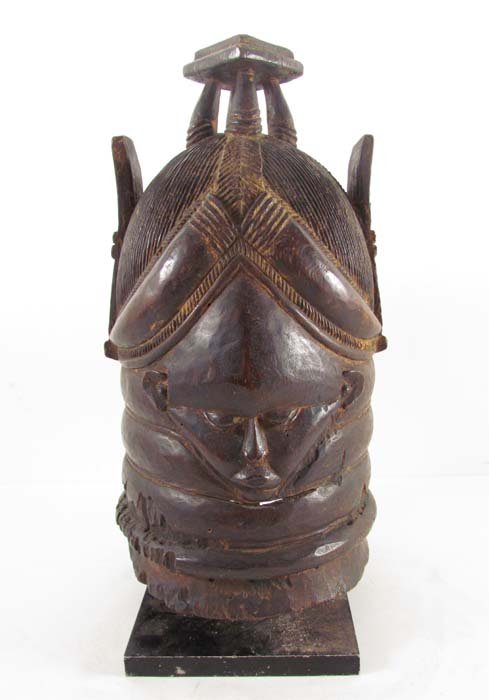 very good BUNDU HELMET MASK Sierra Leone: Artist: Mende Tribe, Sierra Leone Title: Sande Society Mende Helmet Mask or Bundu Helmut Mask Date: early to mid 20th Century Medium: ebonized wood with patina Dimensions: 15.5 x 10 x 11 inches