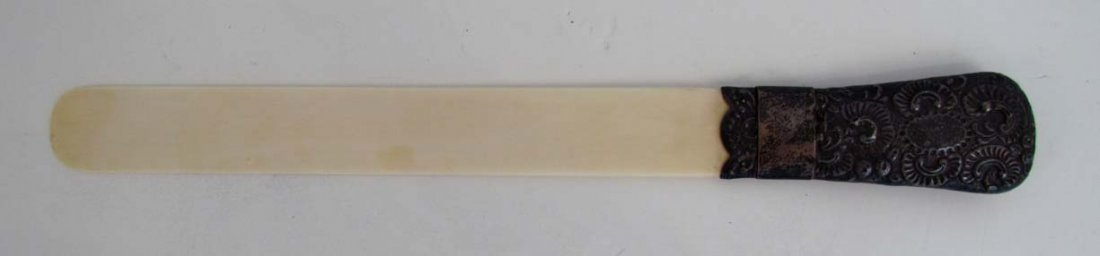 British Repousse silver & Ivory page turner: Title: British Repousse silver & Ivory page turner Date: 19th century London Medium: silver, ivory Dimensions: 17.25 inches long Signature: Hallmarked