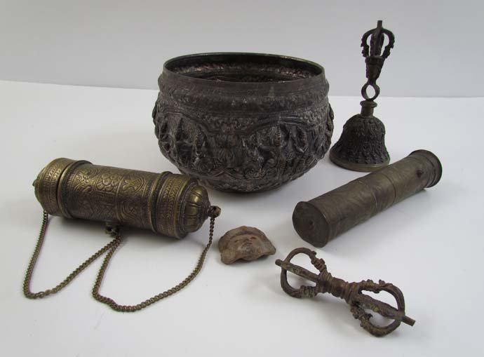 Collection of Tibetan and SE Asian Objects: Title: collection of Tibetan/Asian objects including Tibetan signed player bell,Vajah, engraved bliss cylinder, Indian silver signed embossed bowl, middle eastern brass pepper mill, & pre-Columbian fa