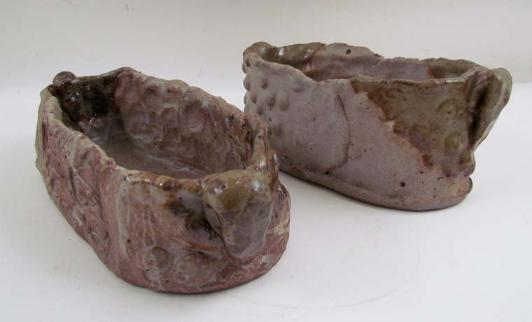 2 Kirk Mangus ceramic Asparagus Dishes: Artist: Mangus, Kirk (Contemporary American Ceramicist) Title: Asparagus Serving Dishes Medium: partially glazed stoneware Dimensions: 3 x 12 x 4.25 inches and slightly smaller Signature: both incised