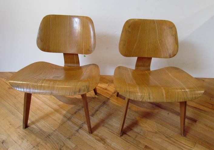 Pair of Vintage 1940s Eames Evans LCW Chairs: Artist: Eames, Charles and Ray Title: 2- 1940s Eames Evans LCW Chairs Date: late 1940's or early 1950's Medium: molded plywood Dimensions: 28 x 24 x 23 inches Description: 12 Screws under seat